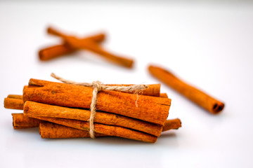Cinnamon Sticks on a White Background 