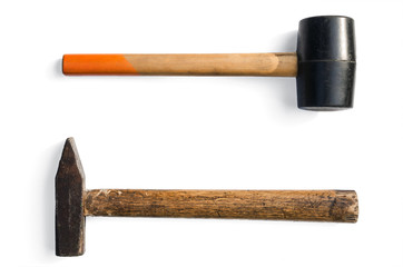Rubber and steel hammers isolated on a white background.