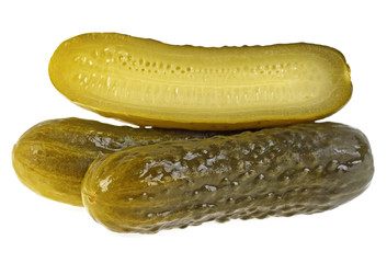 Close up of pickled cucumbers and slice isolated on white background