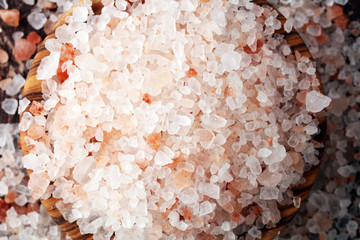 Fototapeta na wymiar himalayan salt in wooden bowl on brown background.