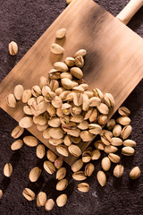 pistachios on wooden board