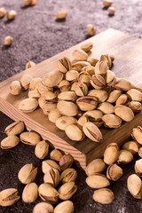 pistachios on wooden board