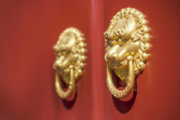 Fototapeta premium Ancient Chinese door knocker, located in Temple of Confucius.