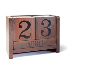 Wooden Perpetual Calendar set to April 23rd