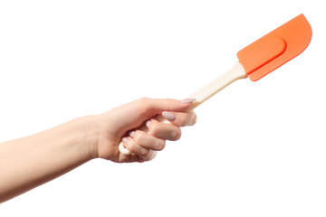 Kitchen silicone spatula in hands