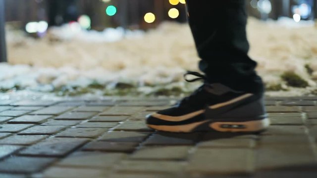 Closeup Man Feet Legs Walking Asphalt Road Blue Sneakers Outside Winter Snow Side View Slow Motion Walker Male Person Walking Steps Sport Shoes Path Foot Leg Step Going Way Street Walk Activity RED 4K