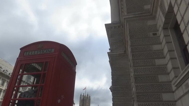 1.	Phone booth- a classic telephone booth ,an old building and a top of Big Ben, London, United Kingdom