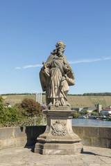 Fototapeta na wymiar Statues on the Alte Mainbruecke in Wuerzburg, Franconia, Germany