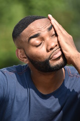 Tired African Person