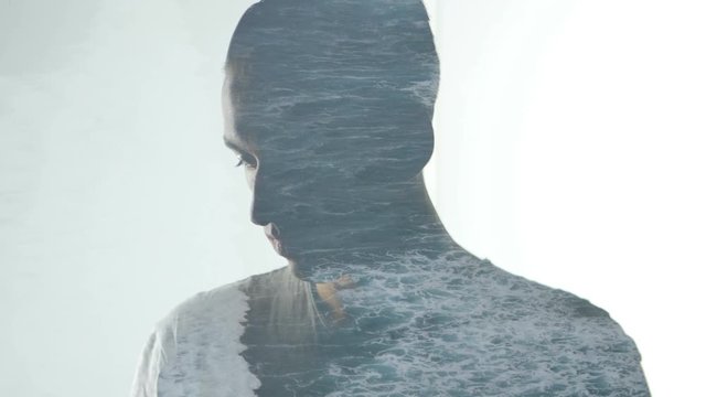 Double exposure of man and aerial coastline. Double exposition of man and ocean waves