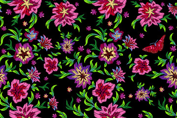 Embroidery bright seamless pattern with flowers and butterflies. Vector embroidered floral design for fashion wearing.