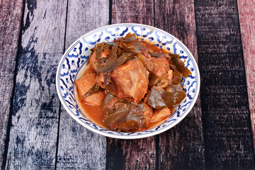 Curry pork with Chamuang (Garcinia cowa) leaves,Local Thai food call as Gang moo cha muang.