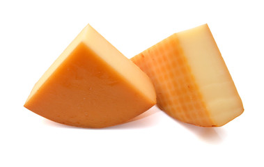 Cubes of cheddar cheese isolated on white