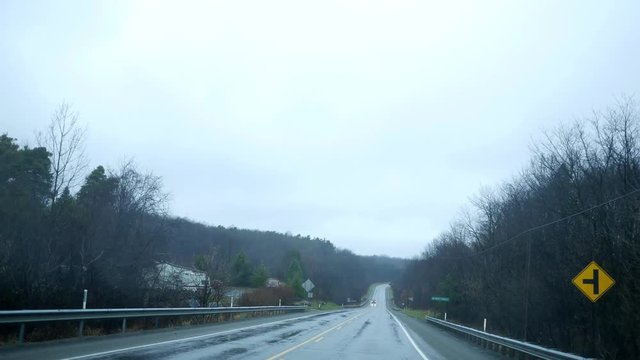 Driving down a rainy road in December in Pennsylvania.  Shot near East Brady, PA