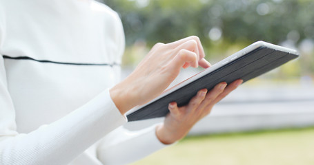 Woman working on tablet computer