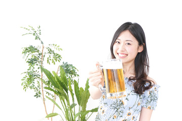 Young woman cracking a beer