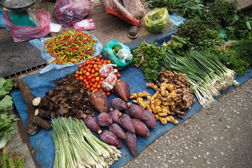 The vegetables in the market look fresh and yummy