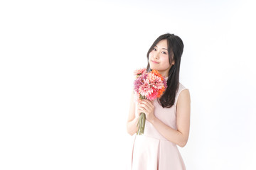 Young woman having flower bouquet