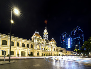 Naklejka premium Ho Chi Minh City, Vietnam - December 21st, 2017: Architecture palace royal night, formerly property of French later People's Committees of attracting tourists sightseeing in Ho Chi Minh, Vietnam
