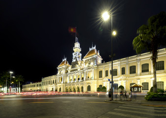 Fototapeta premium Ho Chi Minh City, Vietnam - December 21st, 2017: Architecture palace royal night, formerly property of French later People's Committees of attracting tourists sightseeing in Ho Chi Minh, Vietnam