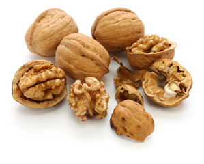 walnuts, kernel and shell isolated on white background
