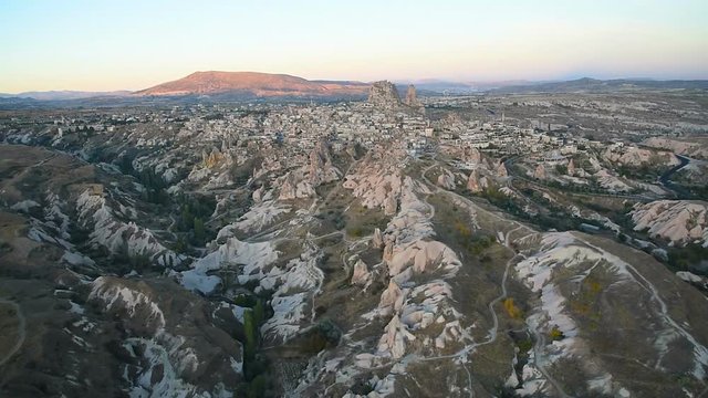 Top view of Uchisar town and castle at sunrise. Cappadocia. Turkey