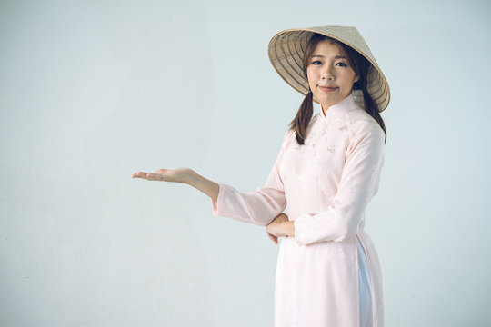 Beautiful woman in pink Vietnam Traditional dress of Dress culture Vietnamese