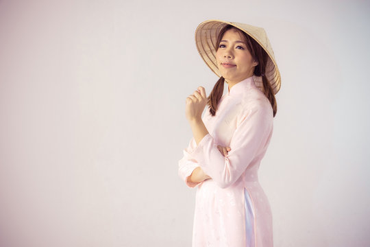 Beautiful woman in pink Vietnam Traditional dress of Dress culture Vietnamese