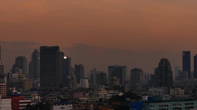 view of the business area in Bangkok, Bangkok is the capital of Thailand and is a popular tourist destination. panning shot