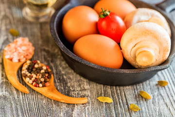 Vegetables, eggs and mushrooms. Rustic food
