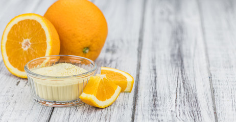 Portion of Orange fruit Powder (selective focus)