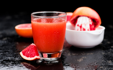 Slate slab with freshly squeezed Grapefruit Juice