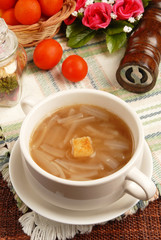Onion Soup in a white bowl   