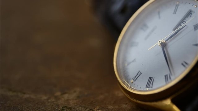 Close up of a wrist watch shot in time lapse. 