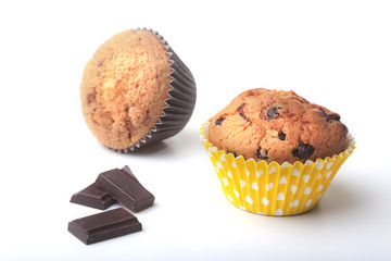 Homemade muffin with raisins and chocolate cupcake. Isolated on white background. selective focus