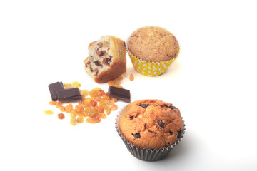 Homemade muffin with raisins and chocolate cupcake. Isolated on white background. selective focus