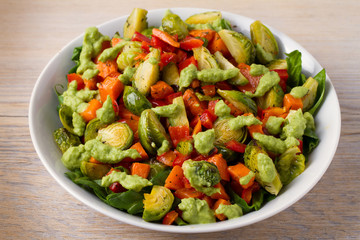 Roasted vegetable salad with avocado dressing, horizontal