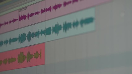 Recording studio, view of the interface of program for recording music, sound peaks during the recording of a song.