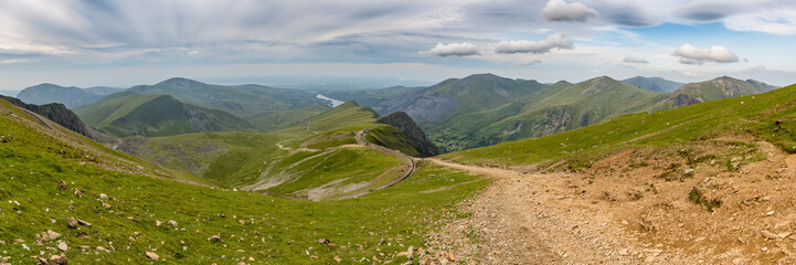 Walking down from Mount Snowdon on the Llanberis Path, Snowdonia, Gwynedd, Wales, UK - looking north towards the Clogwyn station, Llyn Padarn and Llanberis © Bernd Brueggemann