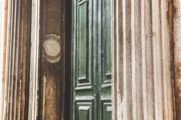 Fototapeta na wymiar corrugated wall and wooden door