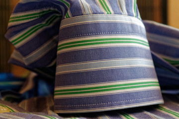 Striped sleeve shirt with green lines texture or background