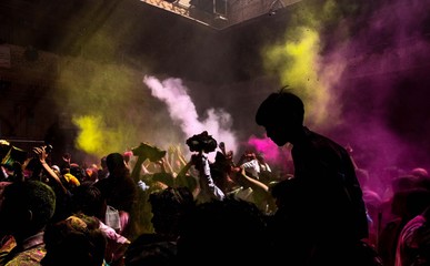 people enjoying holi at Banke Bihari temple in Uttar Pradesh