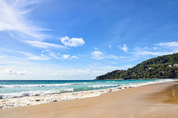 Blue sea. Green Mountain. Clear sky