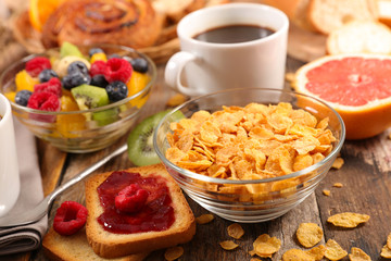 breakfast with fruit,cornflakes,coffee cup