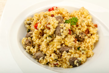 Bulgur with chicken hearts