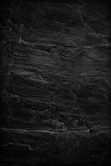 Dark grey black slate background or texture.