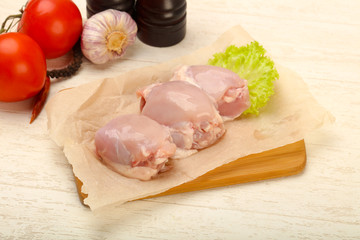 Boneless raw chicken thighs
