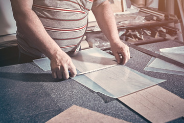 The joiner makes the product frame for the painting.