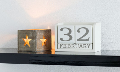 White block calendar present date 32 and month February - Extra day