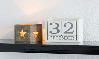 White block calendar present date 32 and month December - Extra day